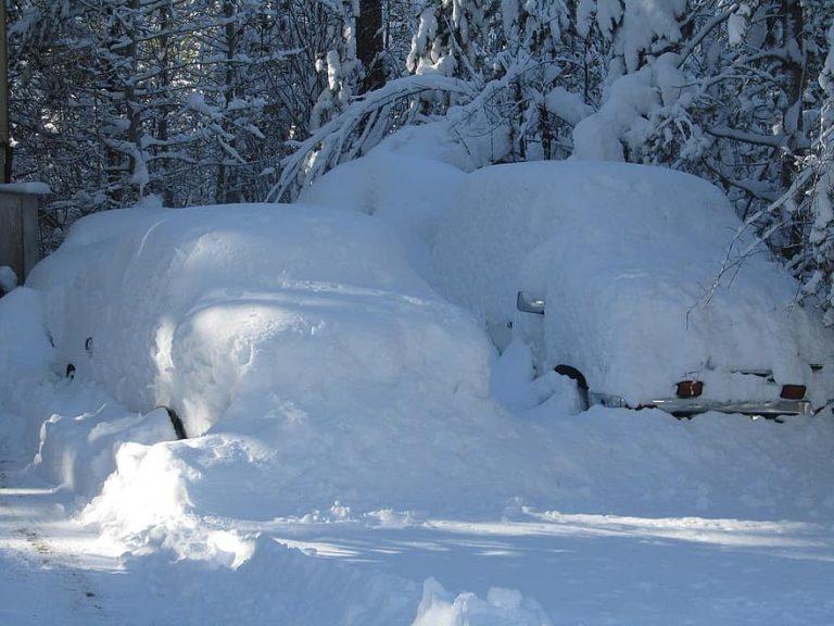 cars coverd with snow winter snow drifts