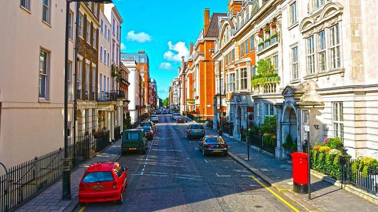 street london england city traffic people europe architecture