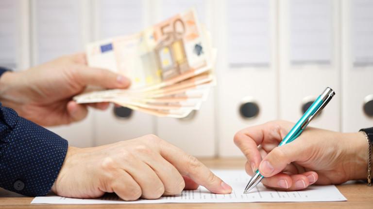 employer or businessman showing where to sign in exchange
