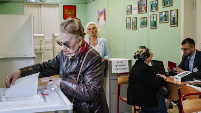 Russians vote in 'Single voting day' elections Russians vote in 'Single voting day' elections