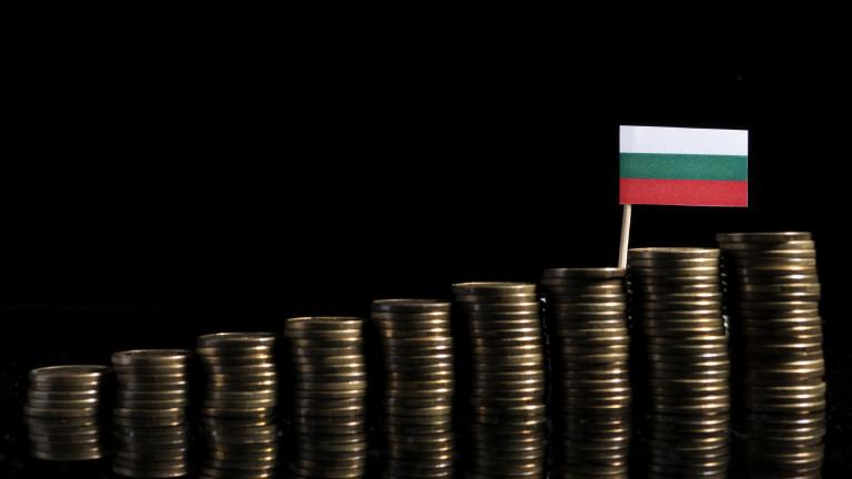 Bulgarian flag with lot of coins isolated on black background