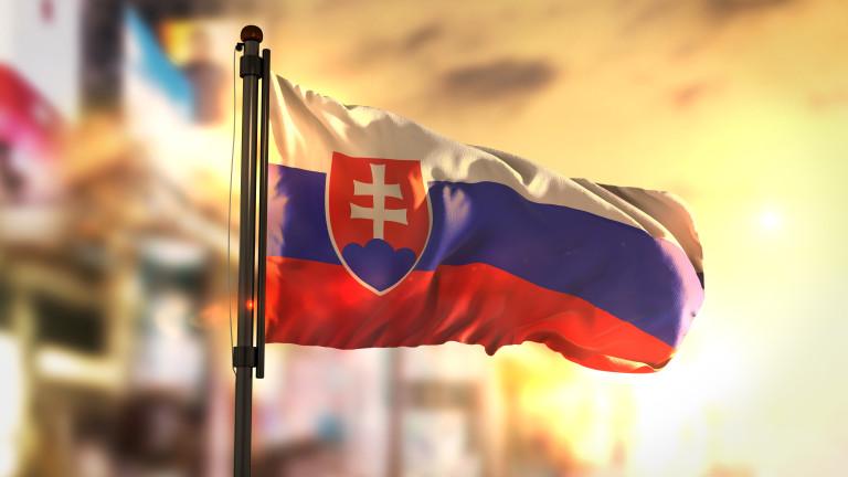 Slovakia Flag Against City Blurred Background At Sunrise Backlight