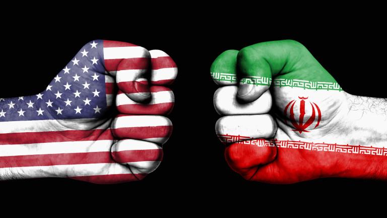 Conflict between USA and Iran male fists