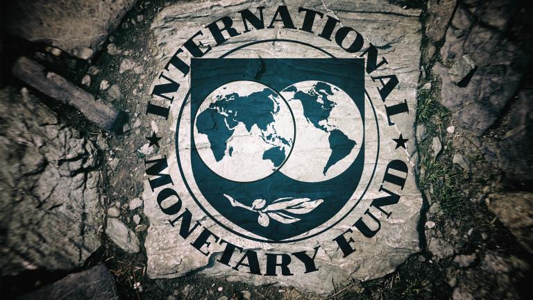 Symbol of the International Monetary Fund, background stone
