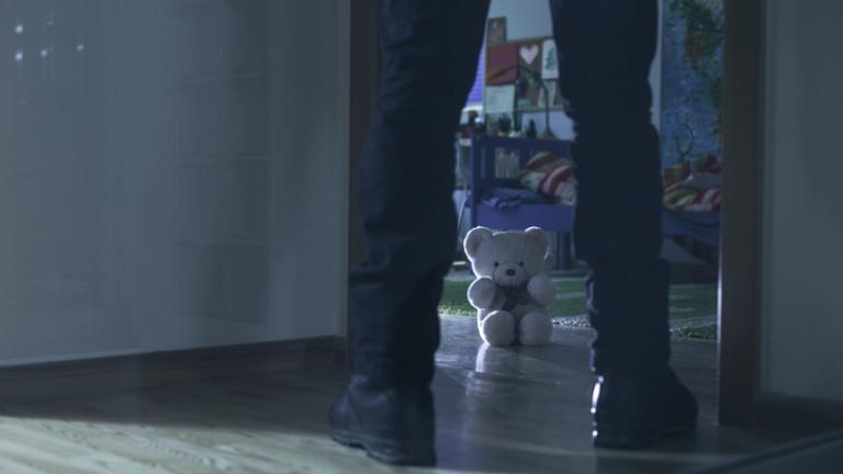 Pedophile standing at the entry