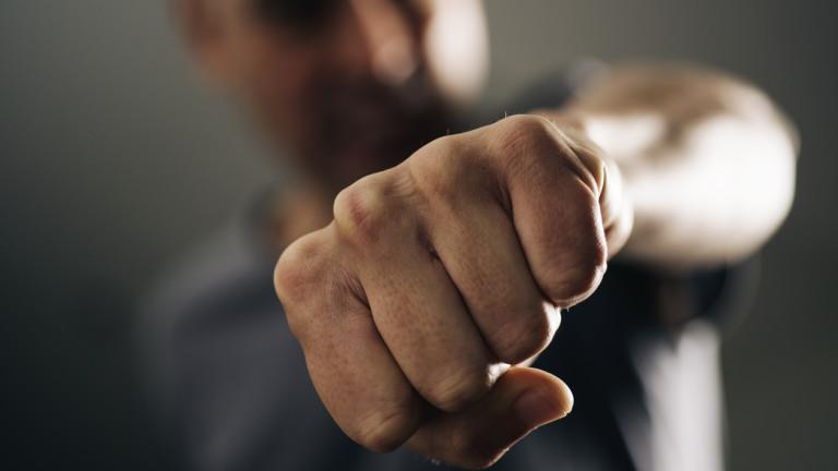 young man throwing a punch