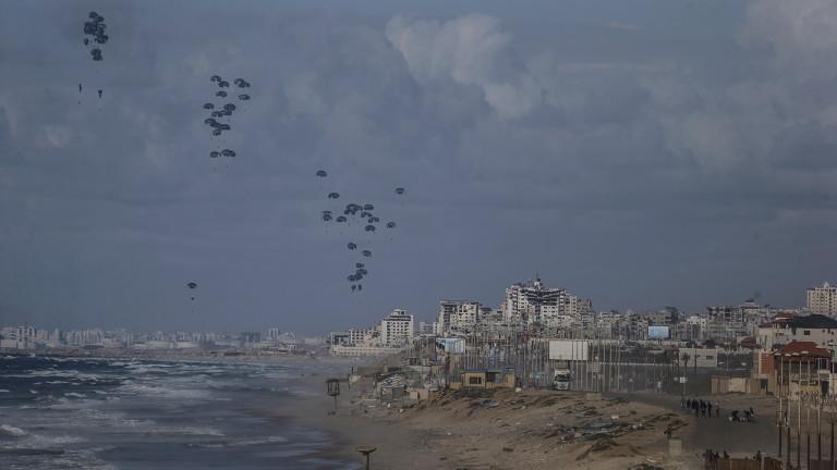 Humanitarian aid is air dropped by US aircraft over northern Gaza Strip