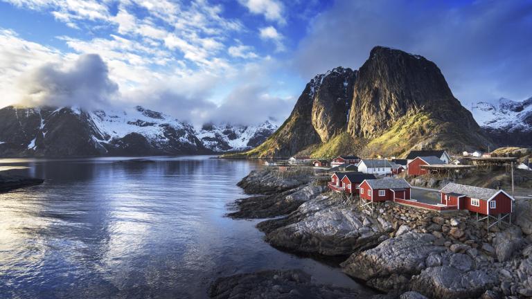 Fishing hut at spring sunset Reine, Lofoten islands, Norway