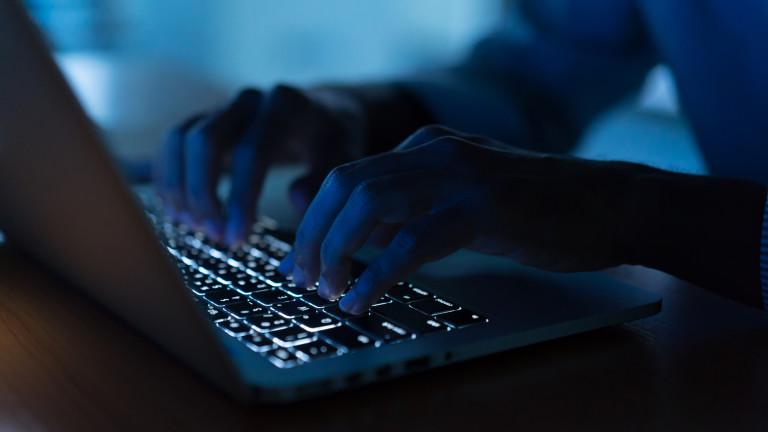 close up programmer man hand typing on keyboard laptop for register data system or access password at dark operation room , cyber security concept