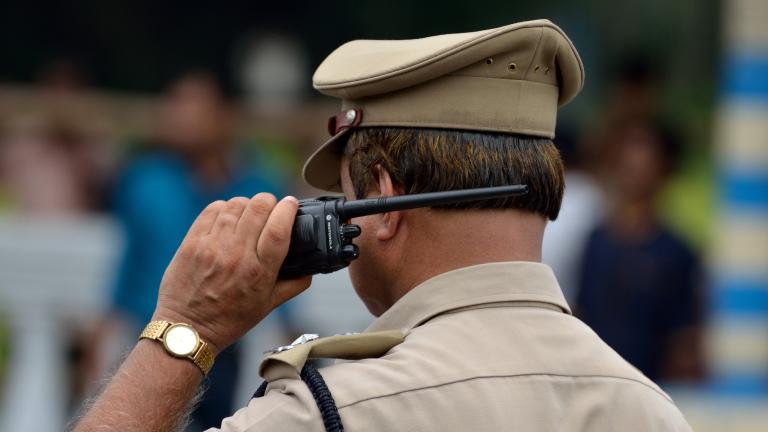 Police with walkie talkie