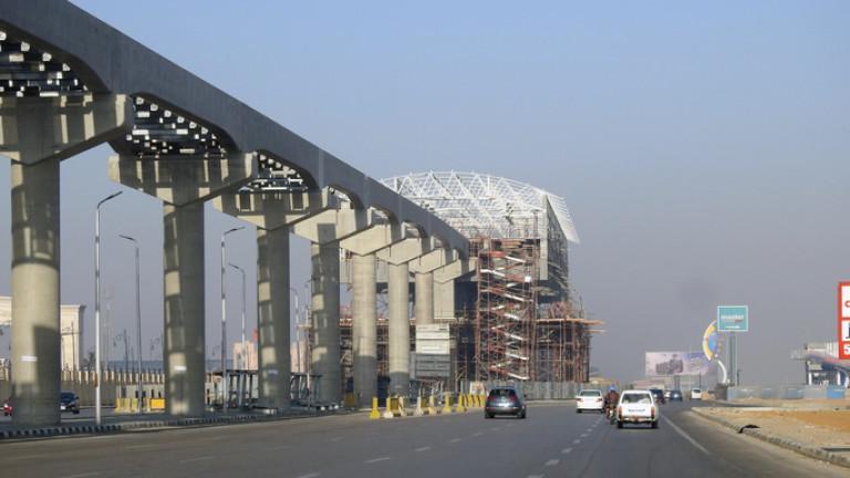 Cairo monorail site that is under construction by Orascom company with the columns and the tracks in New Cairo city, rapid transit system, longest driver less monorail