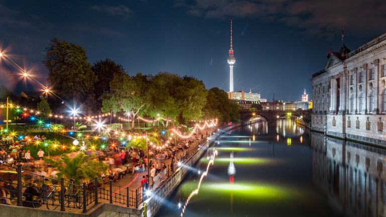 Berlin Strandbar party at Spree river with TV tower at night, Germany