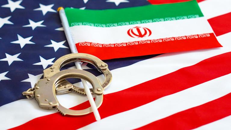Flag of USA and Iran. Handcuffs. Sanctions.