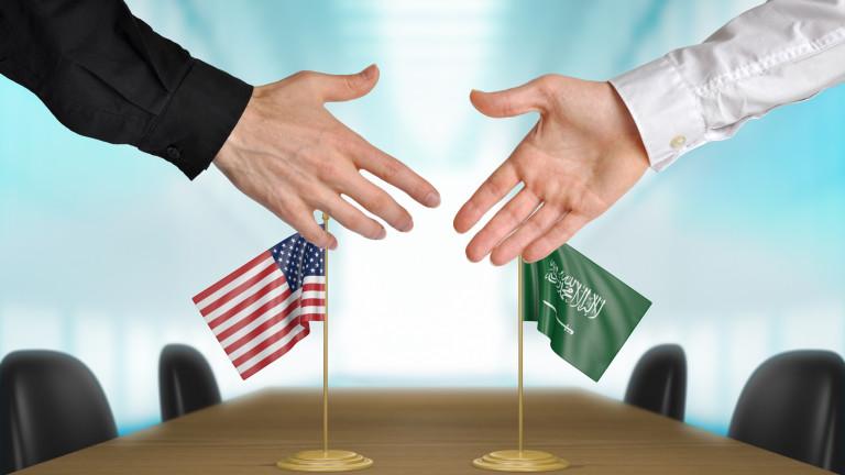 United States and Saudi Arabia diplomats agreeing on a deal