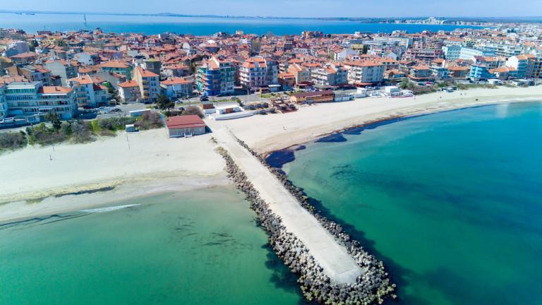 Panoramic view from a height above the town of Pomorie with houses and streets washed by the Black Sea in Bulgaria