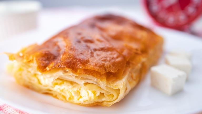 Baked cheese pie with milk. Bulgarian butter banitsa for breakfast